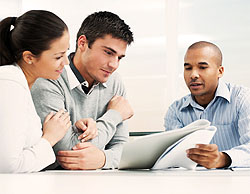Couple meeting with a Consumer Proposal Specialist.
